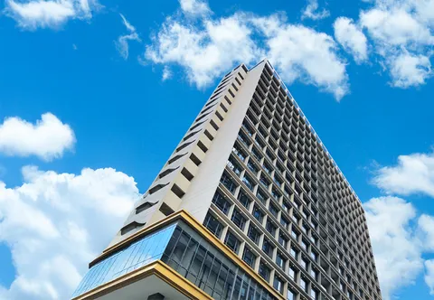 HARRIS Hotel & Suites Nagoya Batam dengan lokasi strategis di pusat Nagoya